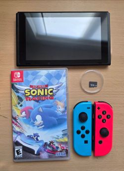 Nintendo Switch V1 with 1 Game and 64GB SD Card. No Dock. No Charger.