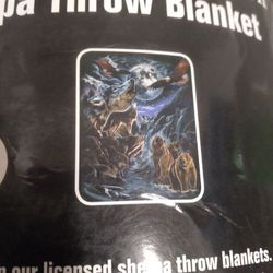 Licensed Sherpa Throw Blanket.  New.   Size 50 X 60