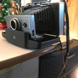 Polaroid automatic 100 and camera