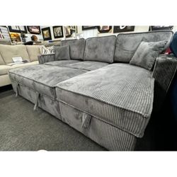 gray corduroy sectional sleeper sofa with storage chaise and pull out bed