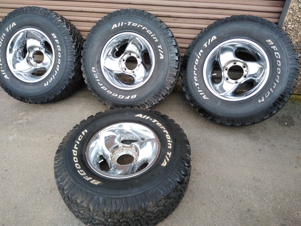 15x8 rims 6 lugs toyotas Chevy Nissan tires 31 10x50 15