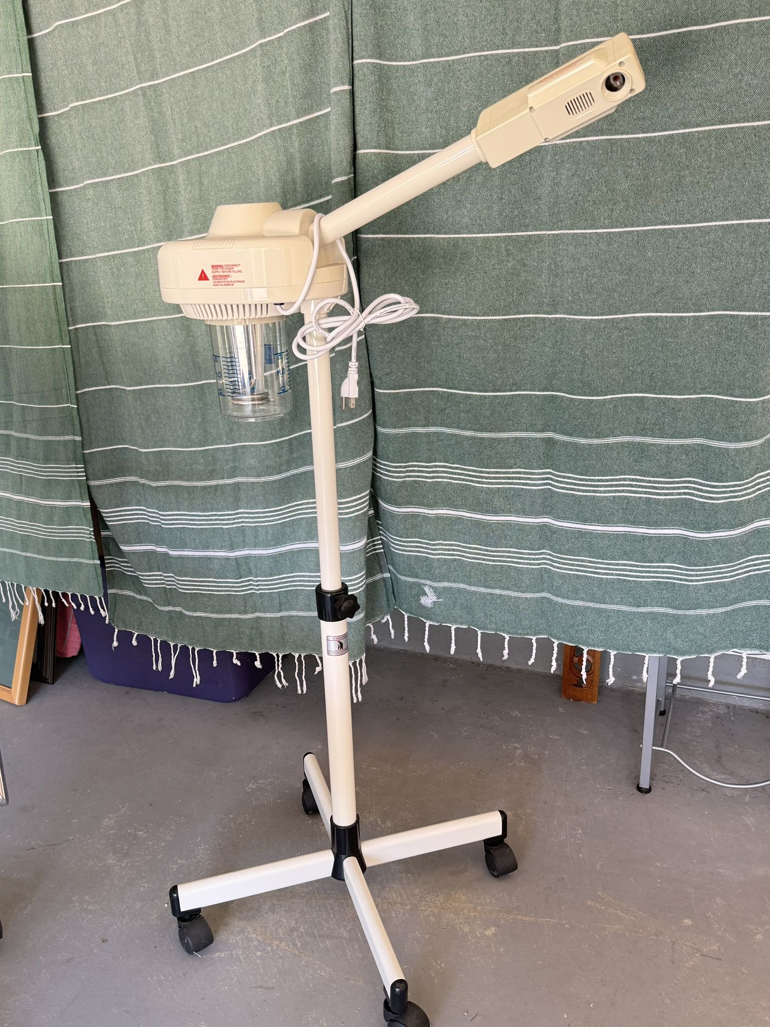 Aesthetician facial bed and steamer
