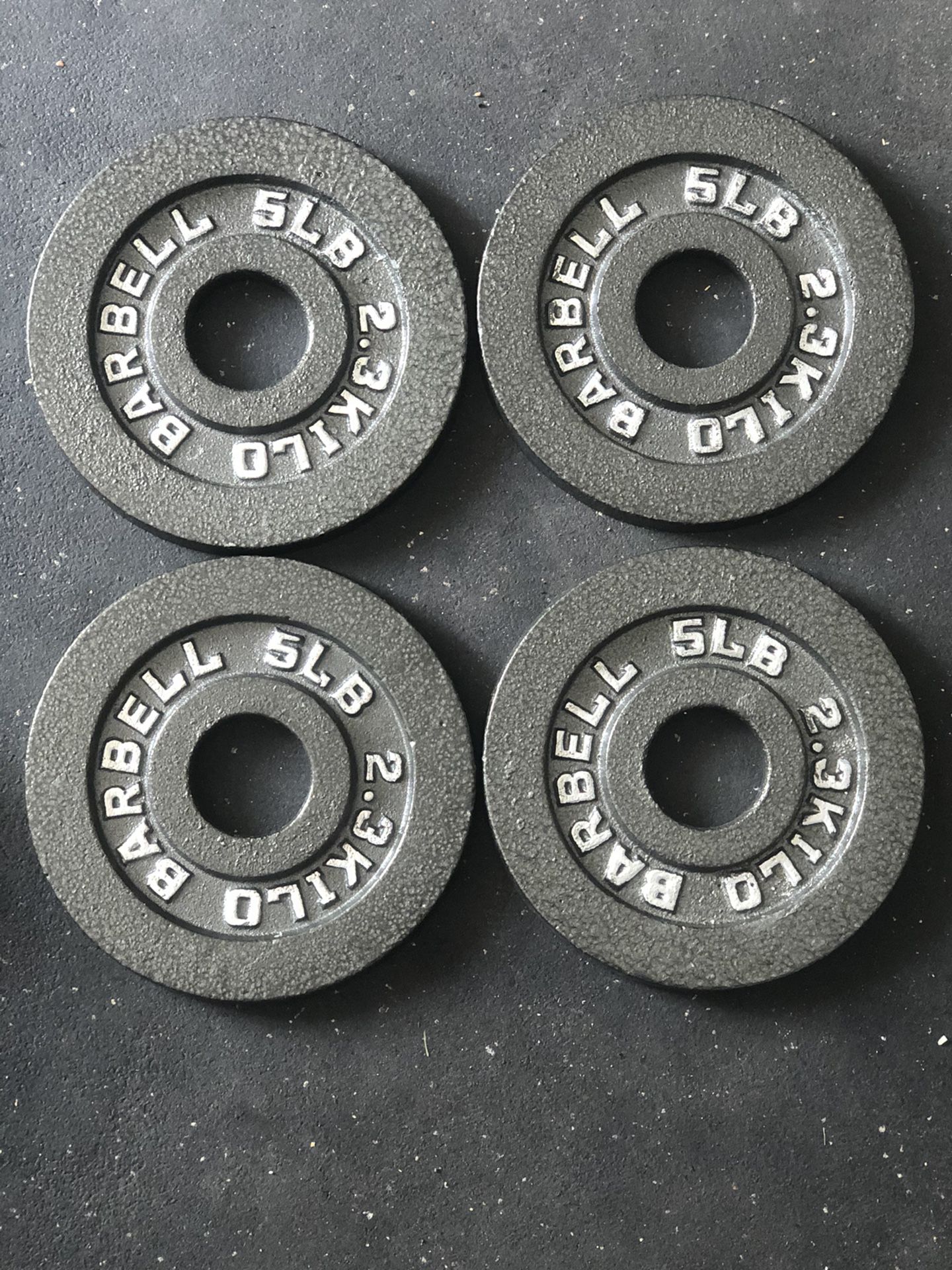 4 5lb Olympic Cast Iron Weight plates 2”