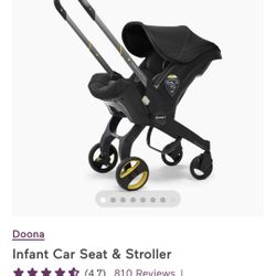Doona ™ Nitro Black Compact Infant Car Seat & Stroller with Base