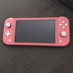 Pink Nintendo Switch Lite ( Includes Just The Switch And Super Smash Bros)