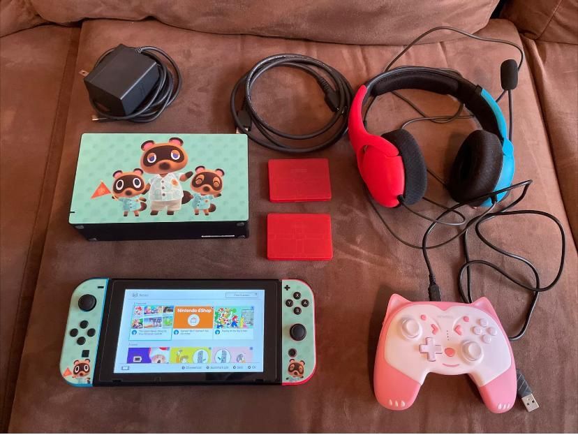 Nintendo Switch Console And Package Comes With Pad And Added Games