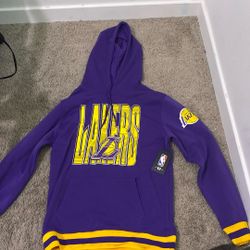 The Color Is Purple And Yellow Size. Small Never Worn. Brand New Still Has The Tags On It .
