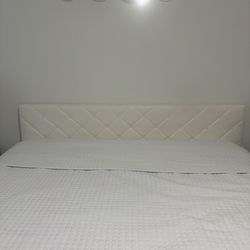 King White leather tufted bed frame with drawers. One year old- like new