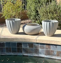 Large faux clay pottery pots. Plastic.