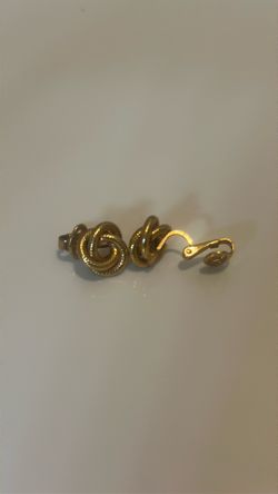 Trifari gold knotted clip on earrings