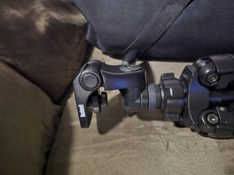 Nixon D80 camera with 2 lenses, filters, and Bushnell tripod