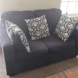 Ashley Furniture Sofa – Dark Gray – Includes Accent Pillows
