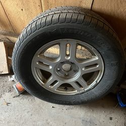 Four Aluminum Ford Rims With Center Caps