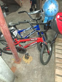 2 bikes and helmet for 2 bikes 200$ never rode