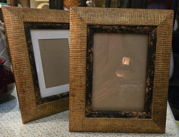 2, 8x10 Gold Frames. They Hold Up To 5x7 Picture