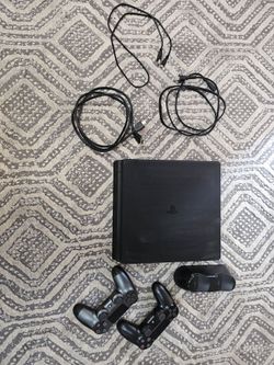 PS4 with 11 games and 2 controllers
