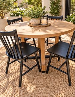 Round Dining Table with 4 Black Chairs – $250