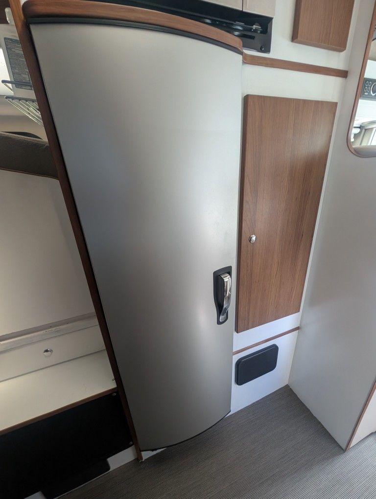 RV Dometic refrigerator and freezer.12V DC, 120V AC and propane