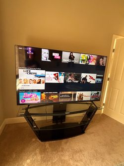Samsung 70 inch smart TV with TV stand