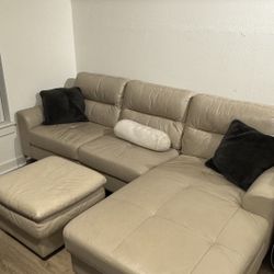 Couch With Pillows And Ottoman