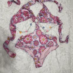 Chic one-piece with vibrant floral design. Perfect for beach days.  New 3x pink daisy bodysuit one piece swimsuit festival rave outfit top edc raver