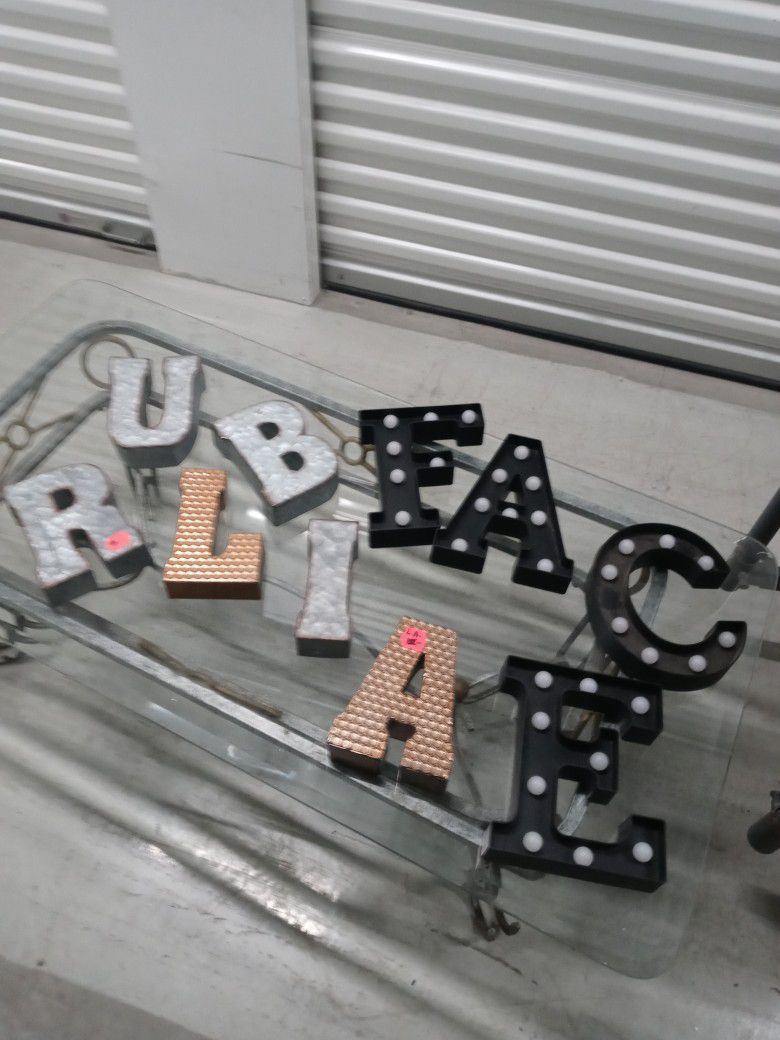 letters metal, plastic and wood