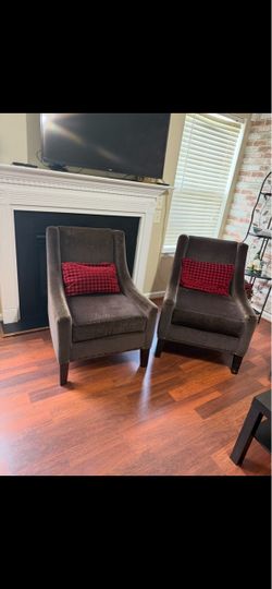 2 brown chairs