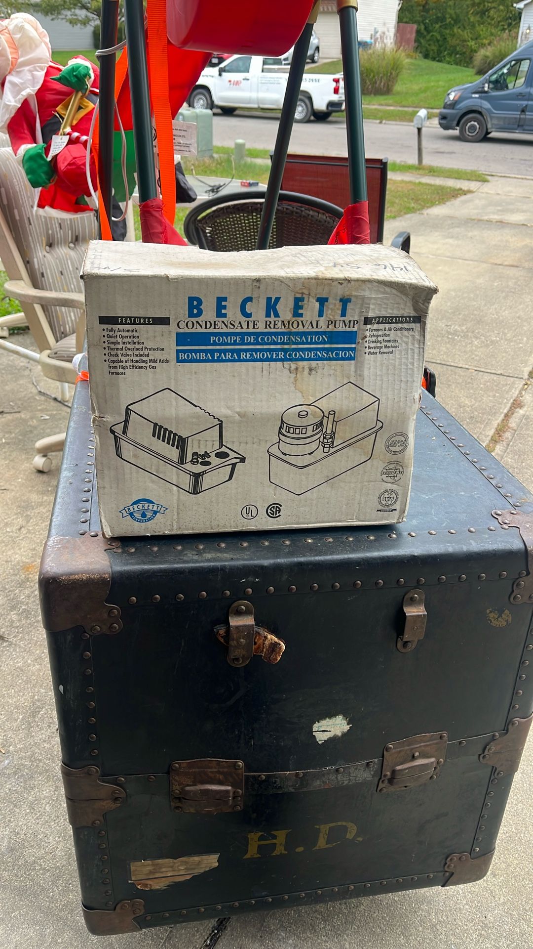 The product in the image is a Beckett CU451UL Condensate Removal Pump. This is a heavy-duty pump designed for removing condensation from various HVAC