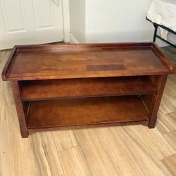 Solid wood coffee table with storage shelves