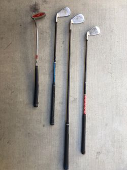 Junior Golf Clubs (8, 9, putter) - used