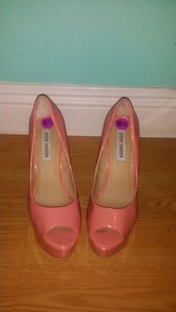 Peep toe peach pumps