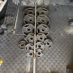 Olympic weights 255lbs total plus 7ft 45lbs bar firm price