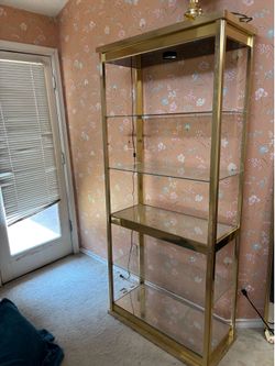 Glass and brass shelf