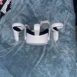 Oculus Quest 2 Vr with well conditioned controllers and a charger