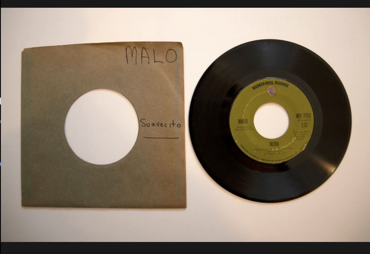 Record 45 RPM Malo Suavecito / Nena - Warner Bros. Records