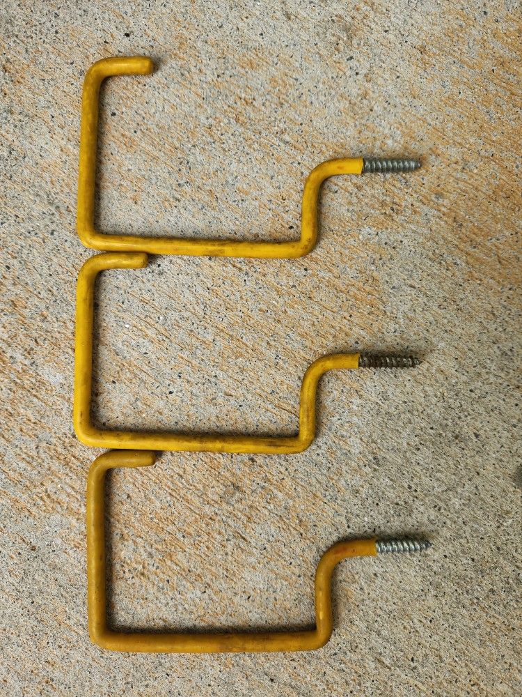 3- Yellow Vinyl coated steel screw-in storage utility hooks.
Perfect for the garage, shed, etc. 7" long x 4" tall.
***** Cash 💸 only, please.