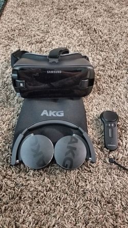 Samsung Gear VR with controller and over ear headphones by AKG.