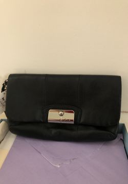 Coach small evening bag black with blue interior. Brand new never been used tag still on it