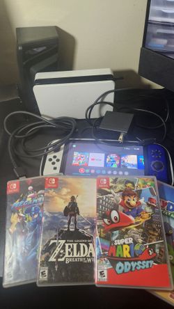 Nintendo Switch OLED + 4 games & Nintendo Case