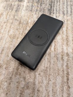 ANKER Portable power bank with built‑in wireless charging pad