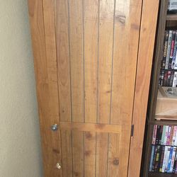 Wooden 4 shelf cabinet.