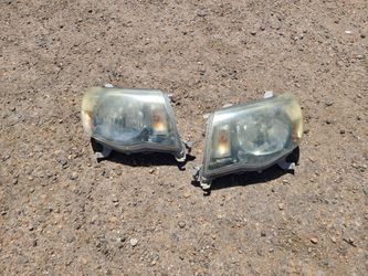 2010 Toyota Tacoma stock headlights