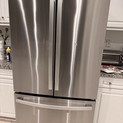 GE Refrigerator Moving Sale!