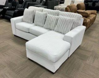 NEW SECTIONAL, INCLUDING FREE DELIVERY PAY UPON ARRIVAL
