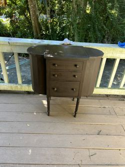 Vintage wood sewing cabinet with drawers – made in Michigan