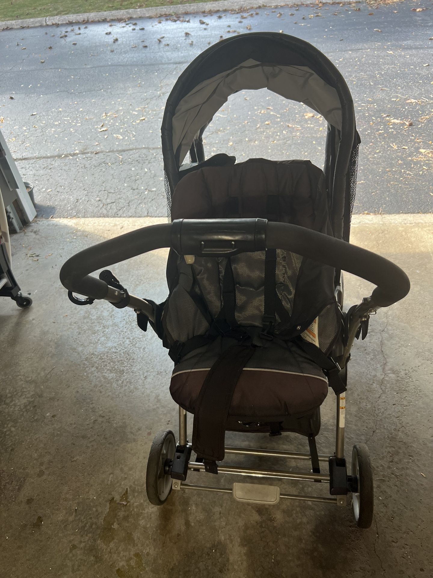 Used Graco double stroller with rain cover - Good condition 