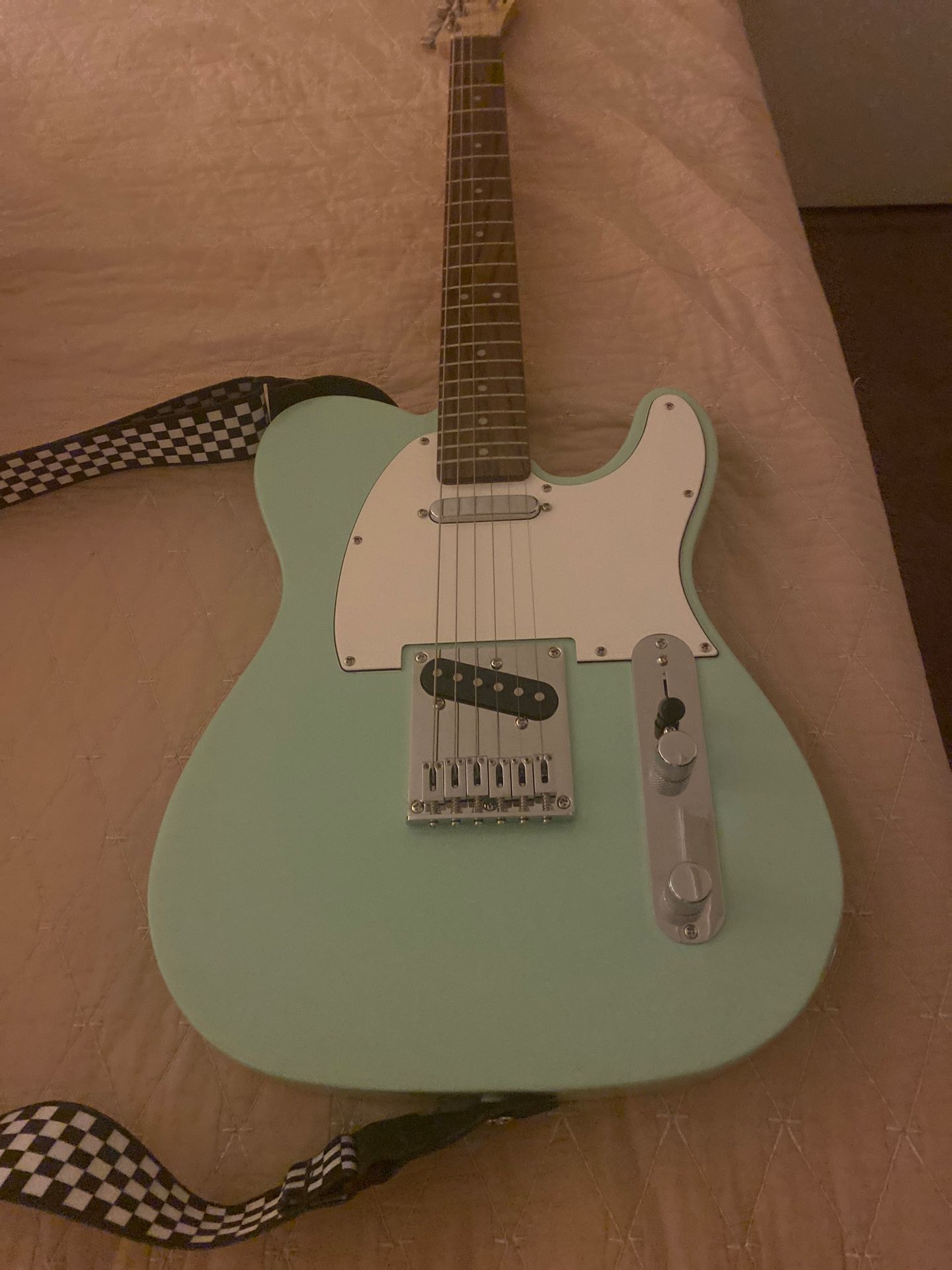 New Squier telecaster seafoam green, Two guitar straps one black and other checkered, back pack case brand new