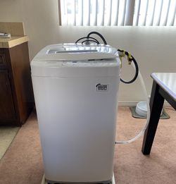 HAIER automatic washing machine. Model HLP24E