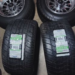 Two Trailer Rims 4 Lug Two Brand New Tires