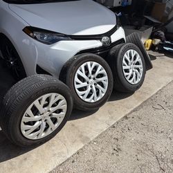 Toyota 16” OEM wheels and tires.